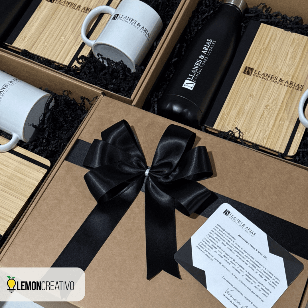 Employee welcome box with a branded mug, bamboo notebook with pen and bottle